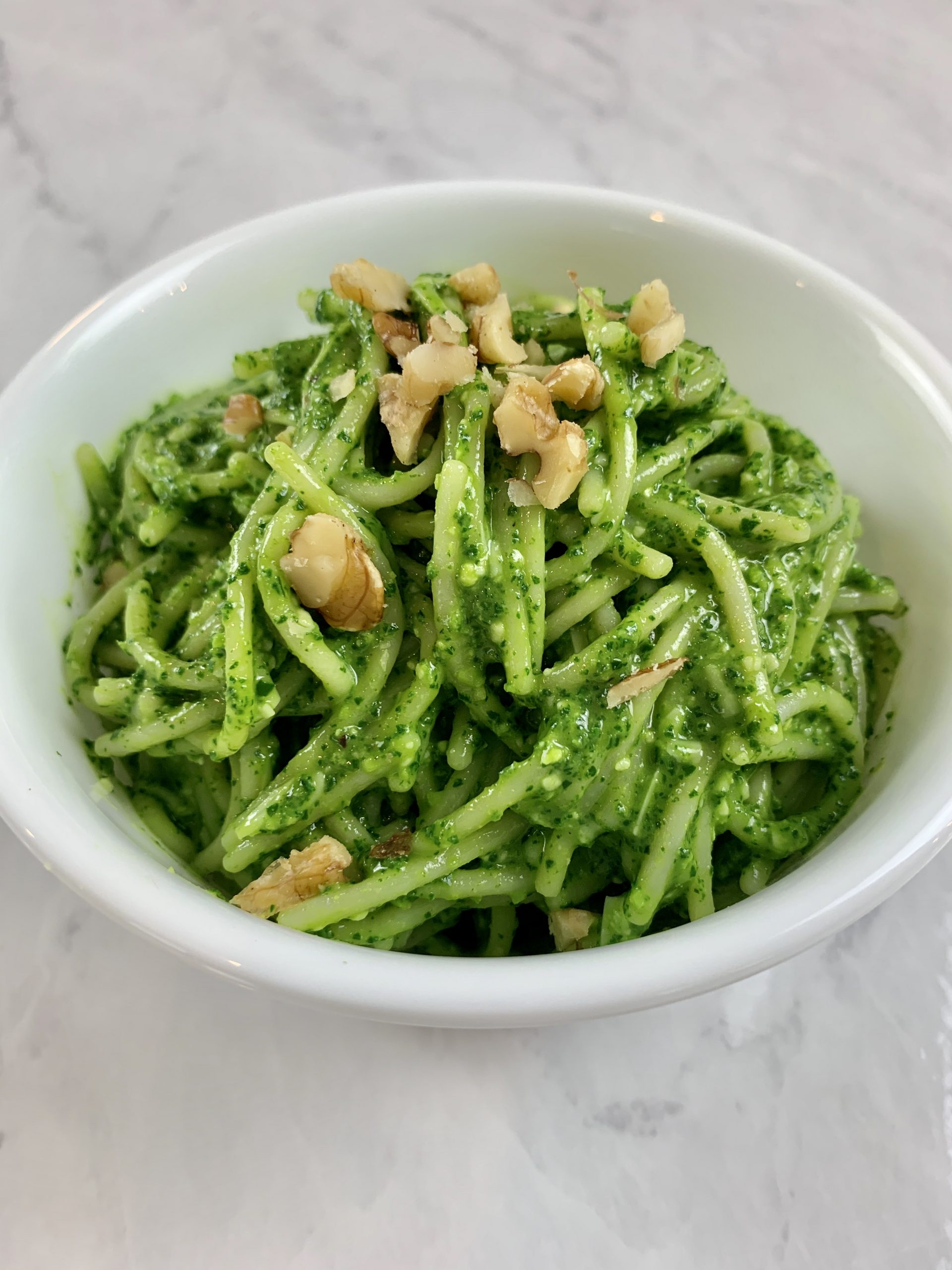 Kale pesto pasta in bowl